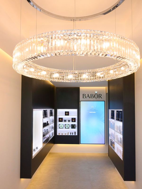 Crystal ring chandelier in a retail fit-out